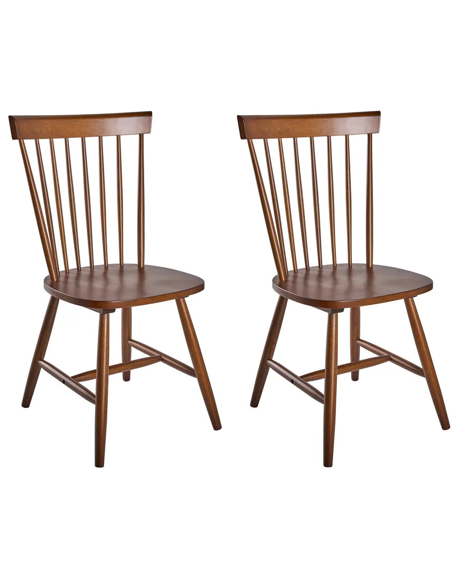 Two wooden dining chairs with spindle backs and straight legs, shown side by side on a plain white background.