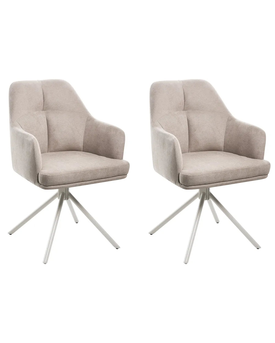 Two matching upholstered swivel armchairs with tufted backs and seats on slim metal star bases, shown side by side against a plain white background.