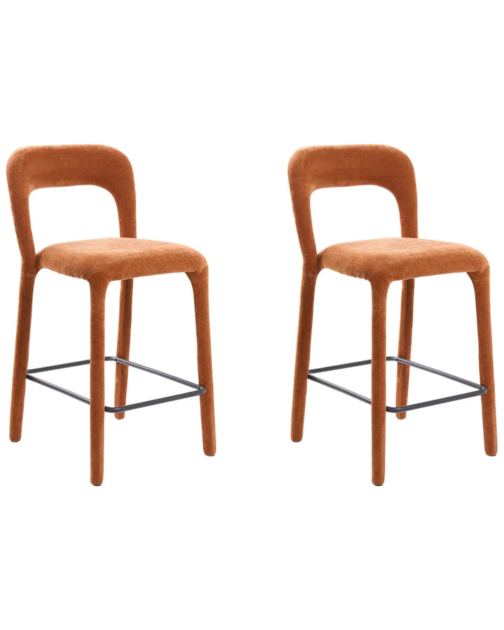 Two modern bar stools with curved orange-brown upholstered seats and backs, shown side by side on a plain white background.