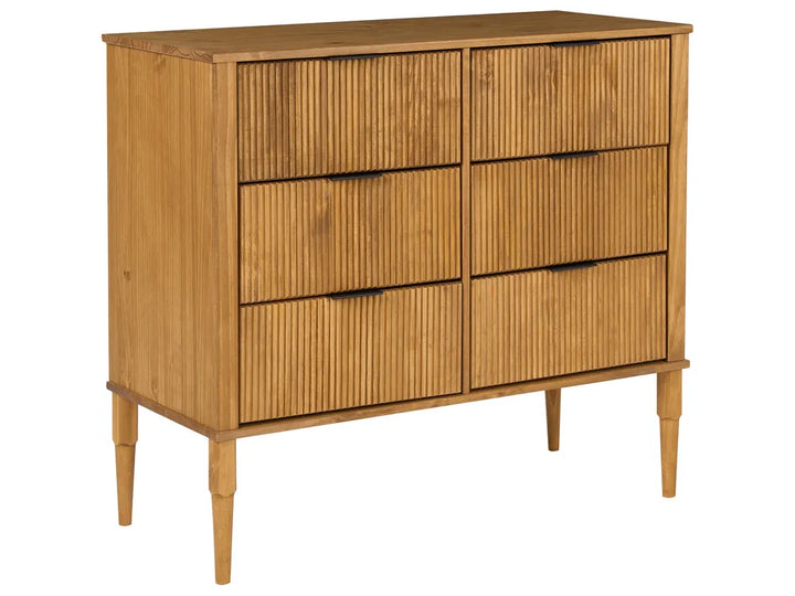A mid-century modern wooden chest of drawers with six drawers, featuring vertical fluted wood panels on the front and tapered legs, shown against a plain white background.