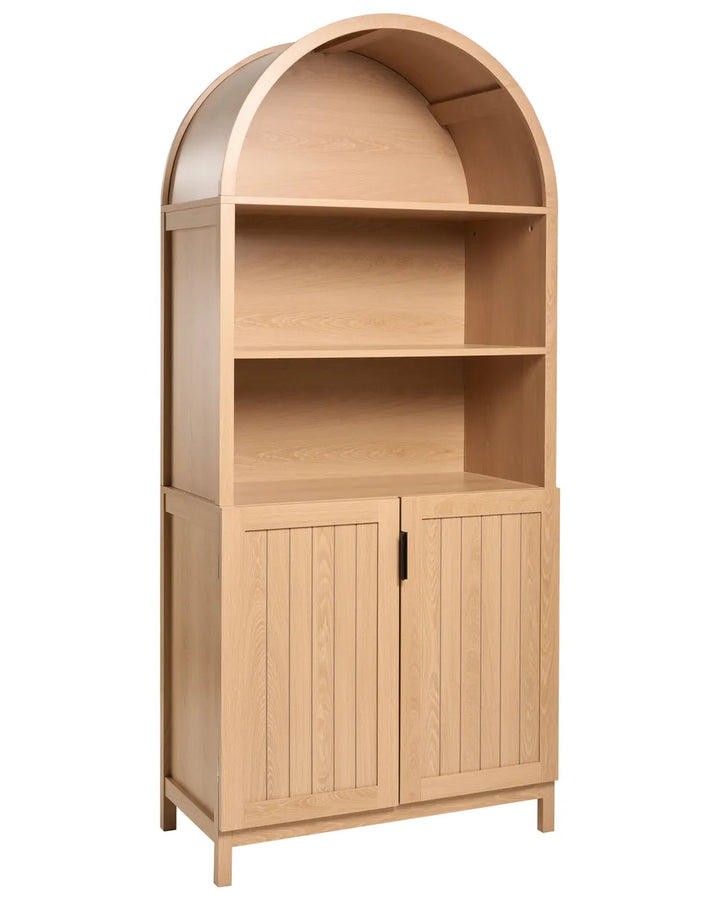 A light natural wood arched bookcase with three open shelves on the upper half and two paneled cabinet doors on the lower half, shown against a plain white background.