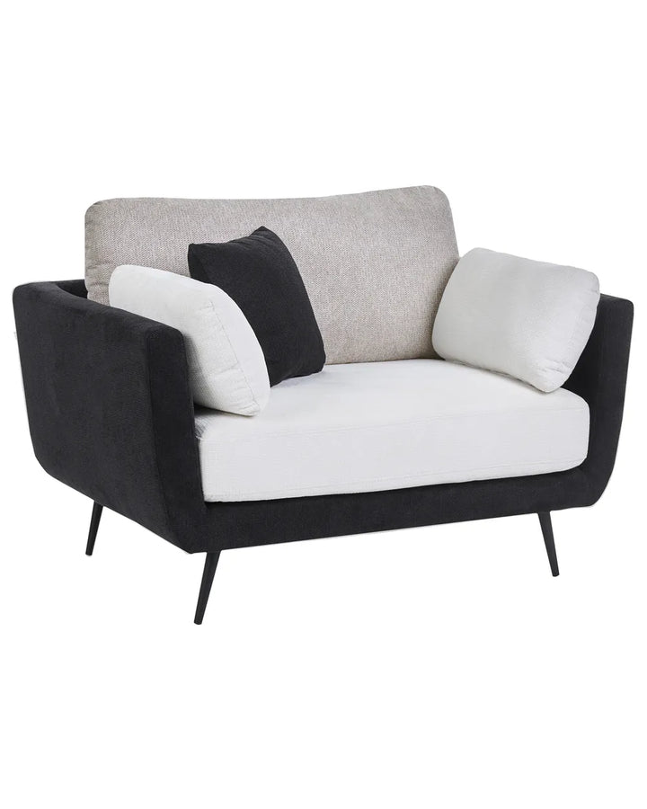 A modern two-seater loveseat sofa with a black fabric upholstered frame and black metal legs, featuring a white seat cushion, a light beige textured back cushion, and two accent pillows (one black, one white) on a solid white background.