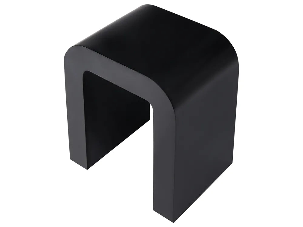 A modern black U-shaped side table or stool with a smooth matte finish, shown from an elevated perspective on a solid white background.