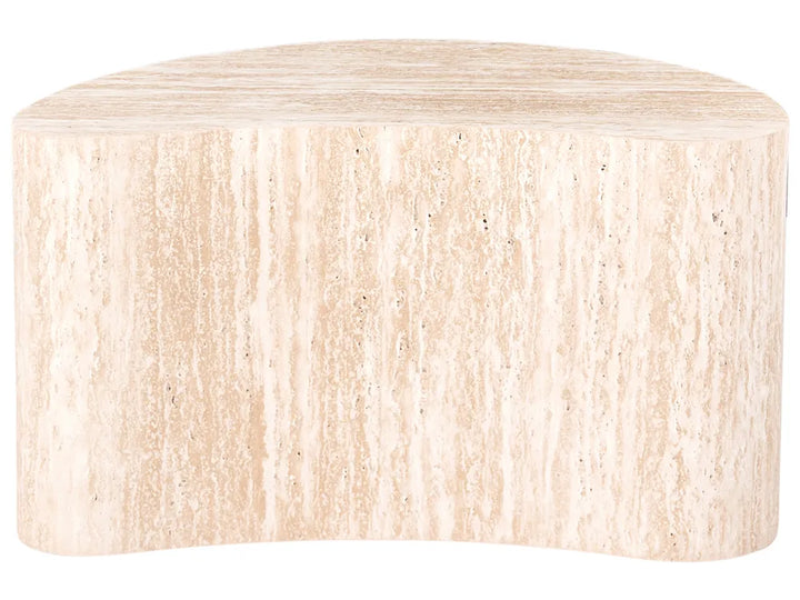 A modern curved side table made of beige travertine stone, showing natural vertical veining and texture, isolated on a white background.