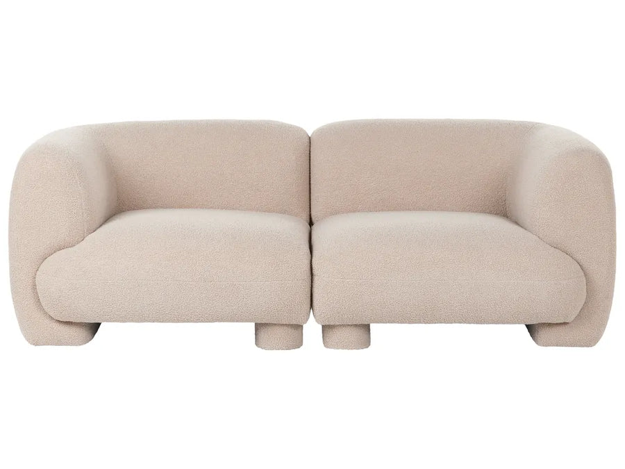 A modern two-seater sofa with rounded, bubble-like arms and legs, upholstered in a textured light beige bouclé fabric, shown against a plain white background.