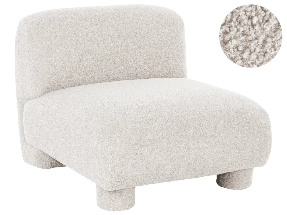 A modern low-profile accent chair upholstered in a textured bouclé fabric, shown from a three-quarter angle with a circular fabric texture inset in the upper right corner.