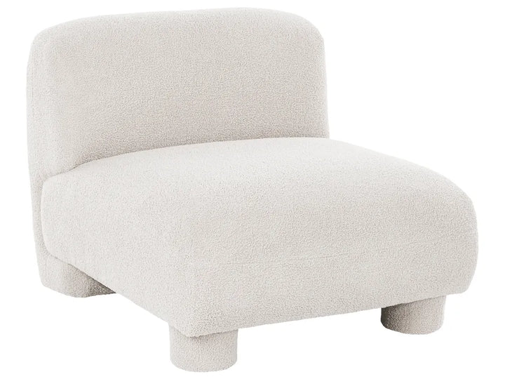 A modern low-profile accent chair upholstered in a textured bouclé fabric in a warm off-white or cream color, shown against a plain white background.