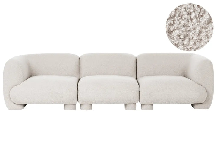 A three-seater modular sofa upholstered in a light beige textured fabric, shown against a plain white background with a circular fabric close-up inset in the top right corner.