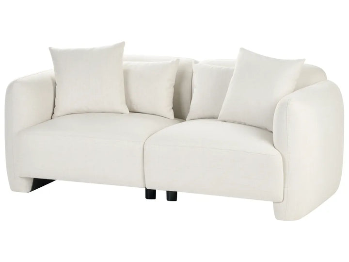 A modern two-seater sofa upholstered in off-white fabric, featuring four matching square throw pillows and short black legs, shown against a plain white background.