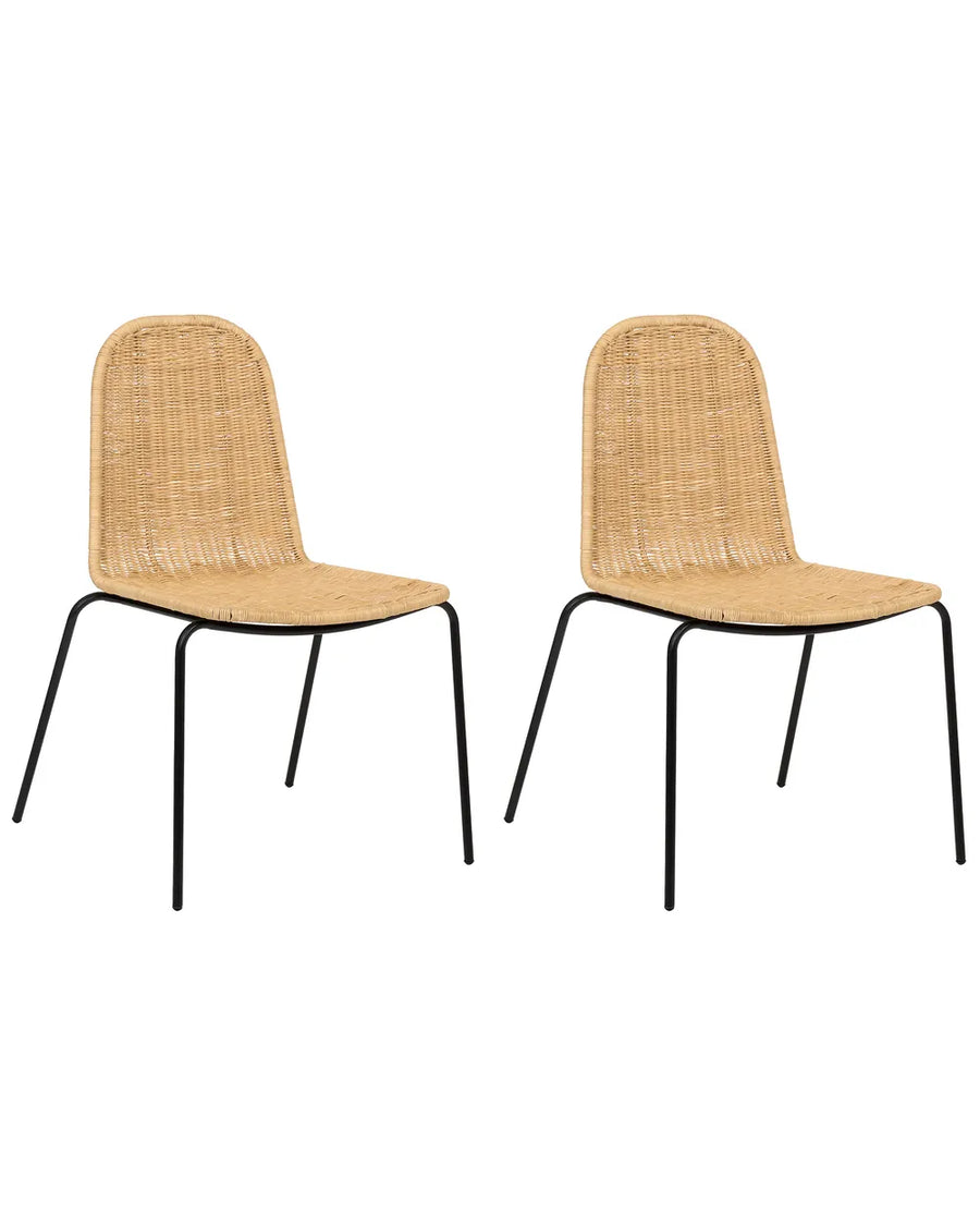 Two matching dining chairs with woven natural rattan seats and backs and slim black metal legs, shown side by side on a plain white background.