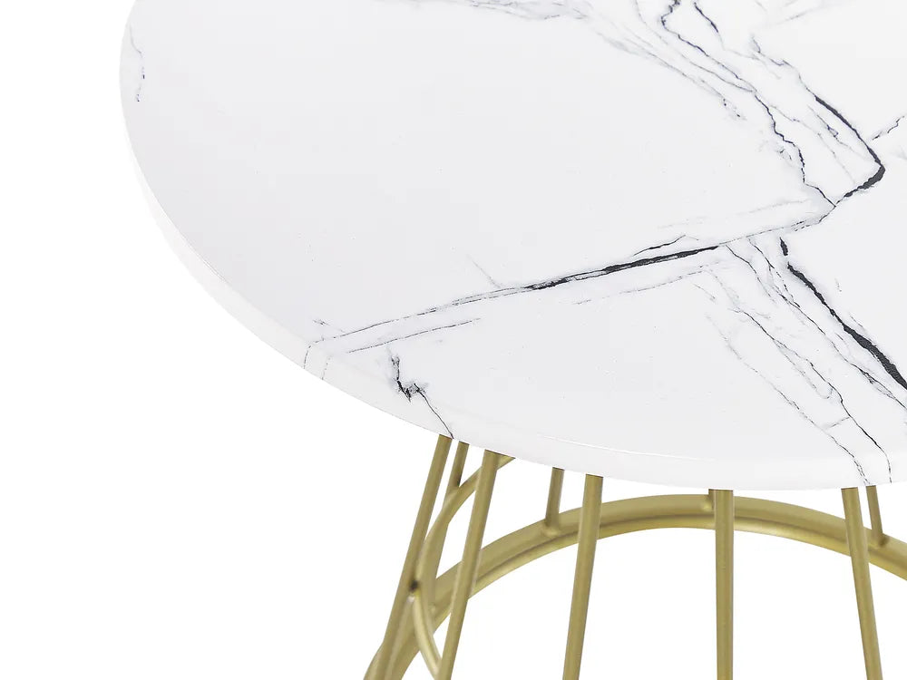 Close-up of a round white marble tabletop with black veining and a gold metal wire base on a white background.
