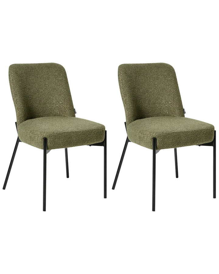 Two matching upholstered dining chairs with textured olive green bouclé-style seats and backs and slim black metal legs, shown on a plain white background.