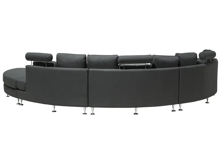 Black curved sectional sofa on a white background