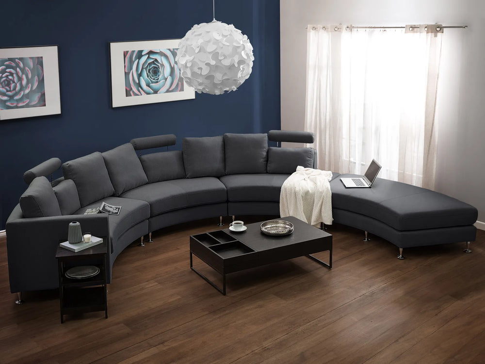 Curved grey fabric modular sofa