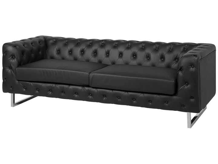 A black tufted leather sofa with two seat cushions and slim silver metal legs, shown against a plain white background.