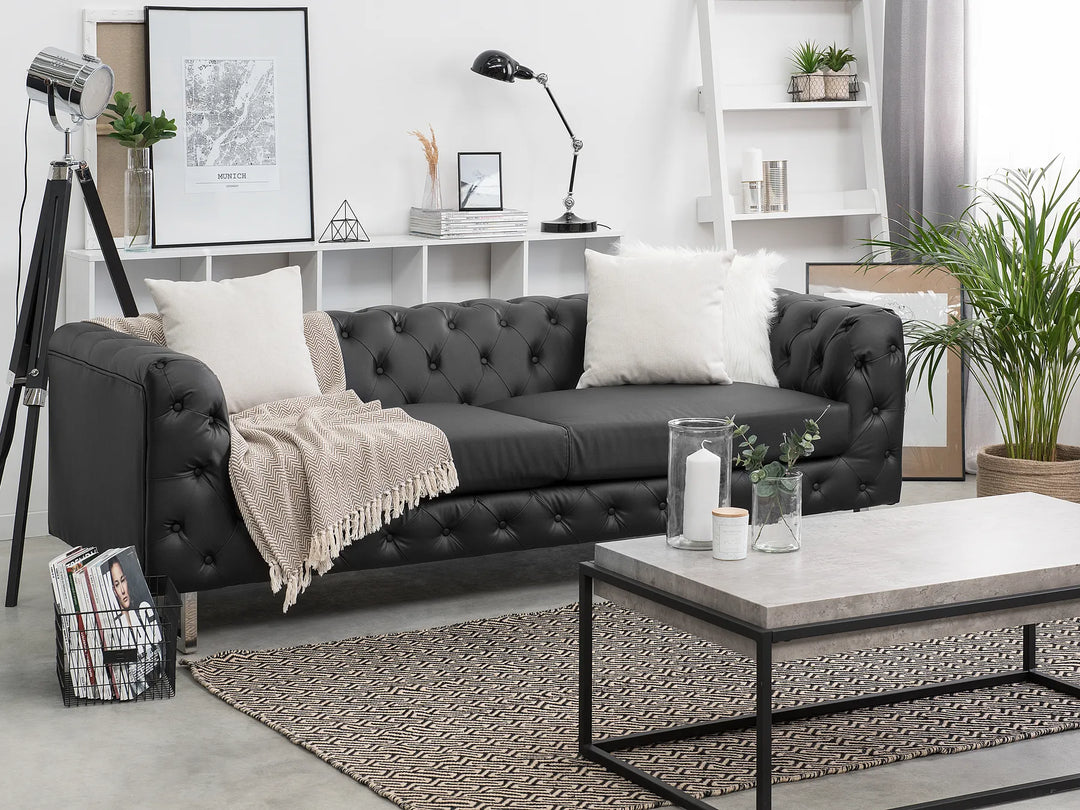 Black faux leather sofa with modern design