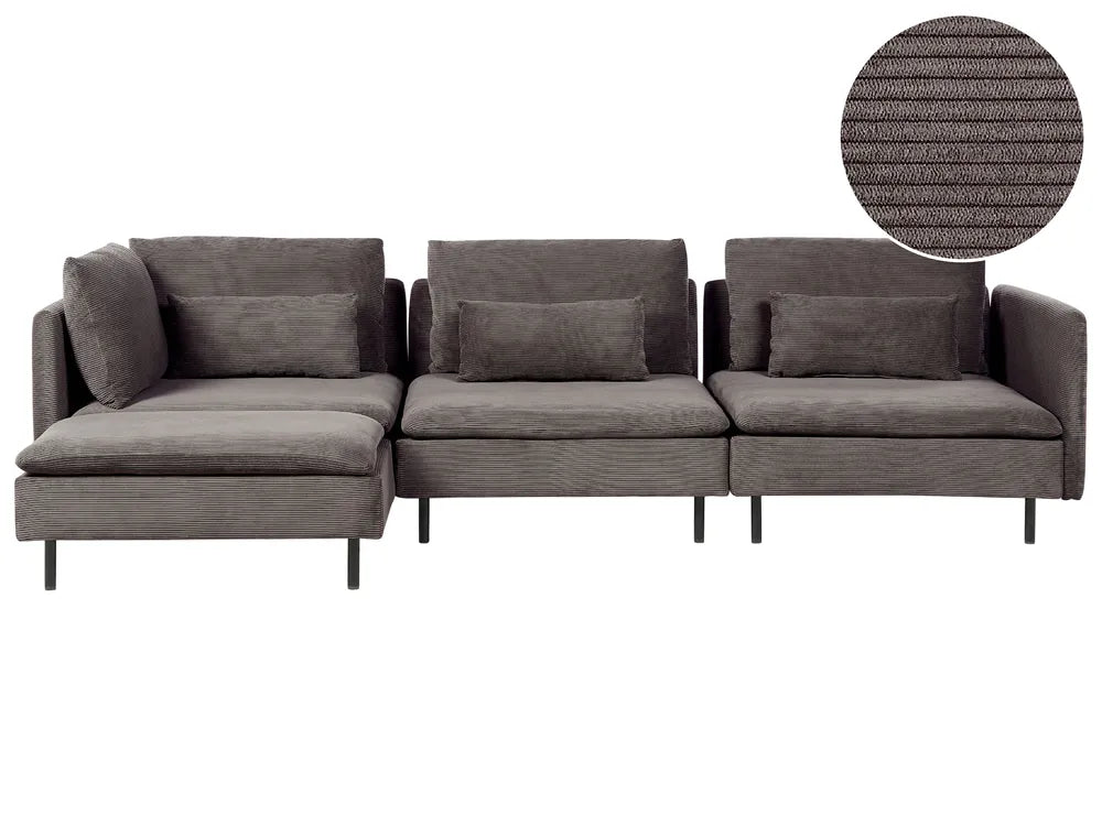 A three-seater sectional sofa upholstered in textured dark gray fabric, featuring a left-facing chaise lounge and a circular fabric close-up inset in the top right corner.