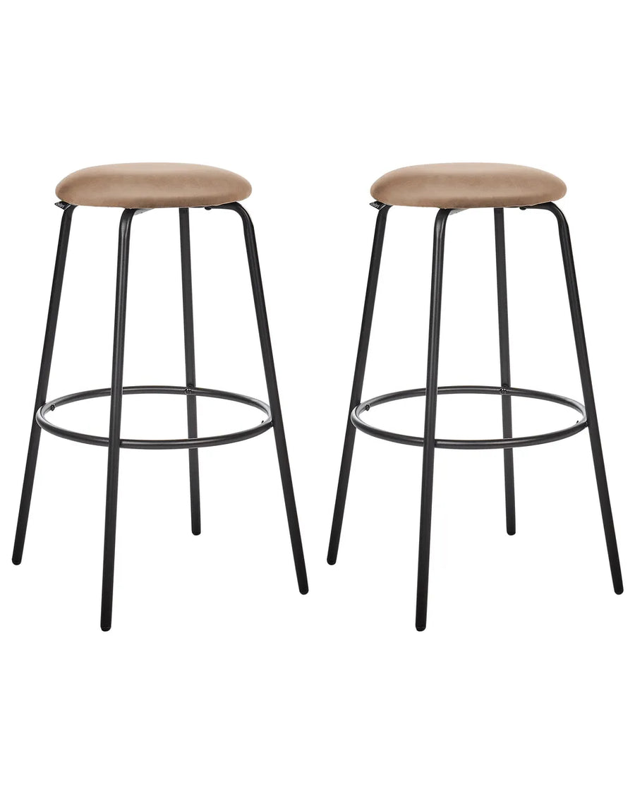 Two matching bar stools with round tan upholstered seats and black metal legs, shown on a plain white background.