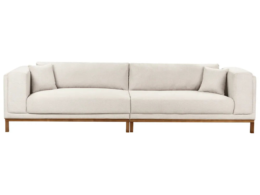 Beige sofa with wooden frame on a white background
