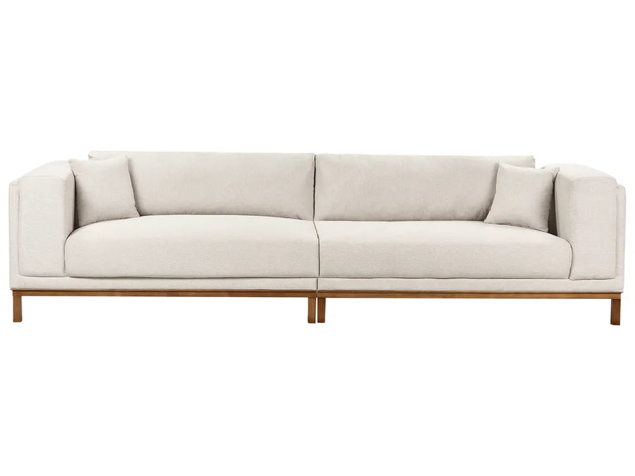 Beige sofa with wooden frame on a white background