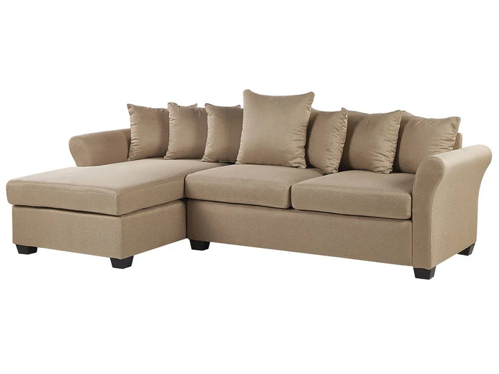 A beige fabric sectional sofa with a left-facing chaise lounge, multiple matching back cushions, and dark block feet, shown on a plain white background.