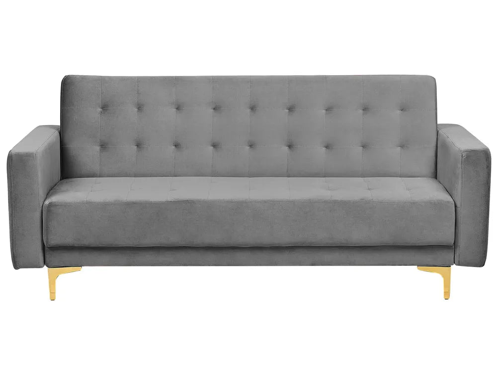 A modern gray velvet loveseat sofa with a tufted backrest and slim gold metal legs, shown against a plain white background.