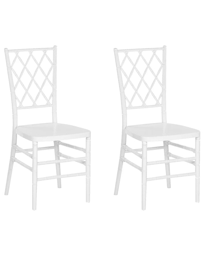 Two white chairs with lattice back design on a white background