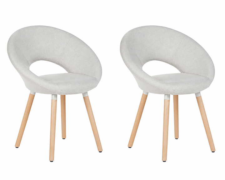 Two modern upholstered dining chairs with light gray fabric seats and natural wood legs, shown side by side on a white background.