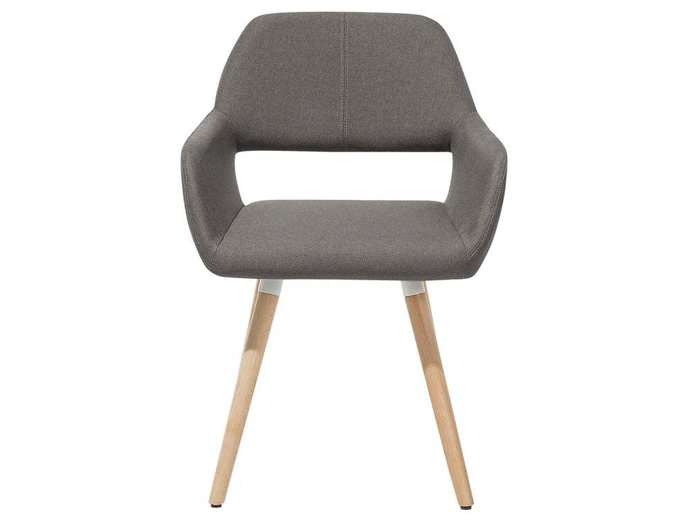 A modern upholstered dining chair with a gray fabric seat and backrest, featuring integrated armrests and light natural wood legs, shown against a plain white background.
