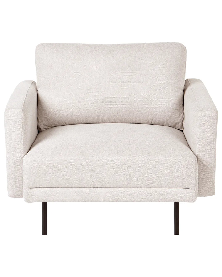 A modern single armchair upholstered in a light beige textured fabric, featuring dark tapered metal legs, shown against a plain white background.