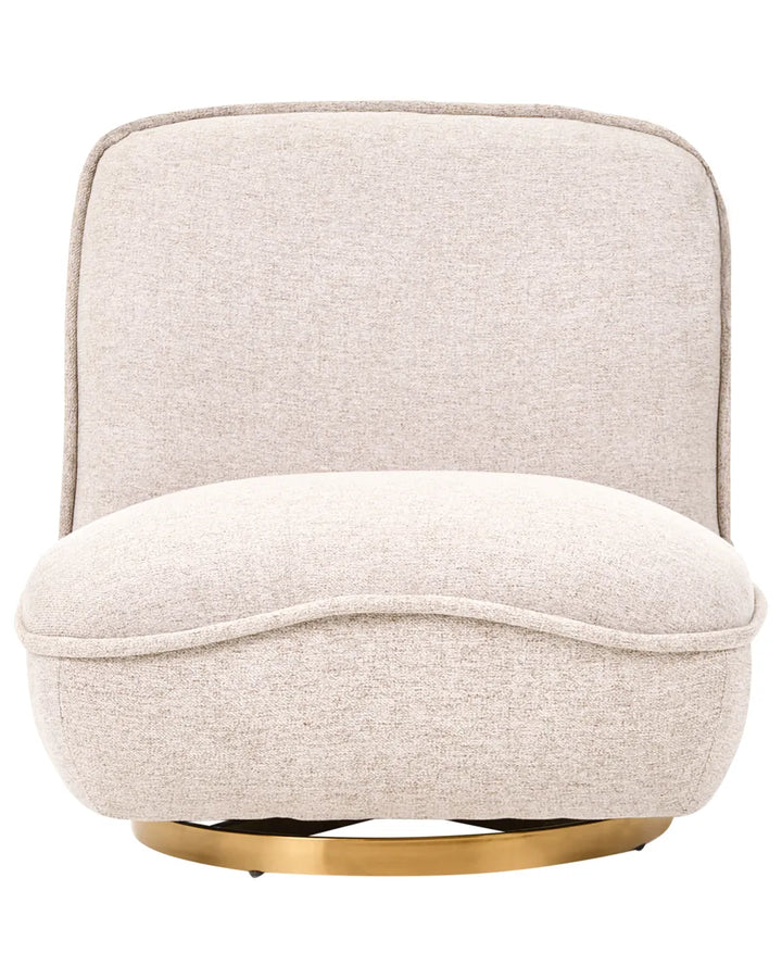 A modern upholstered swivel chair with a rounded, cushioned back and seat, upholstered in a textured light beige fabric, supported by a circular brushed gold metal base.