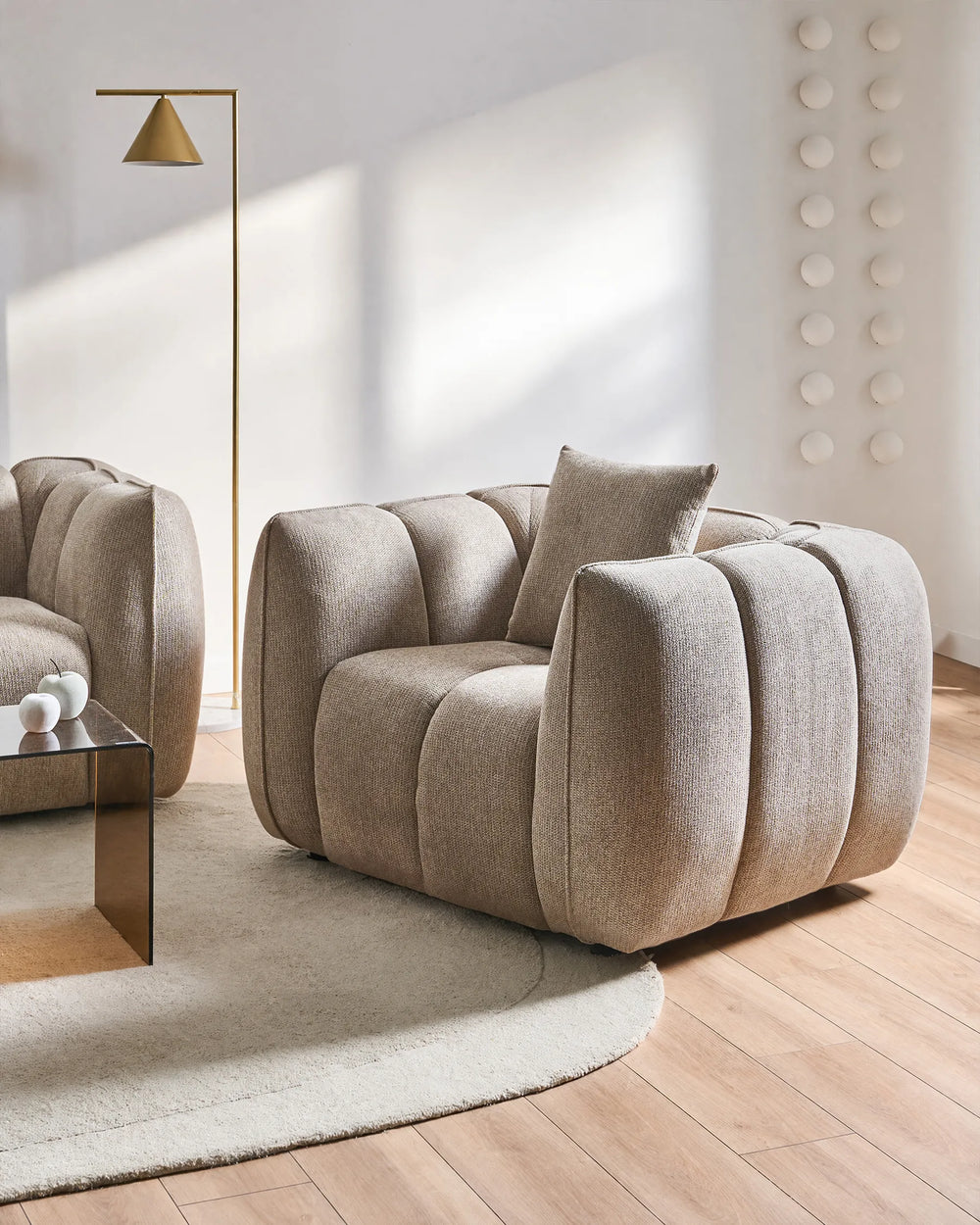 Taupe upholstered armchair