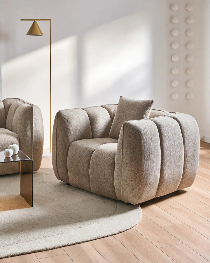 Taupe upholstered armchair
