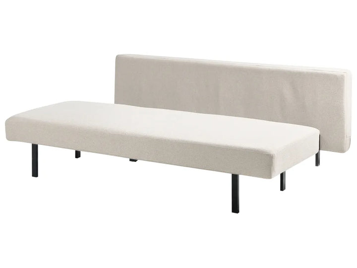 An upholstered futon sofa bed with a rectangular cream fabric cushion, a matching backrest, and slim black metal legs, shown on a plain white background.