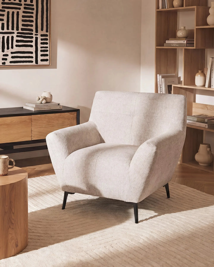Beige upholstered lounge chair
