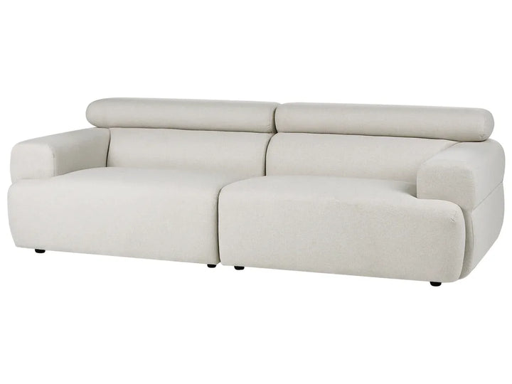Off-white upholstered three-seater sofa