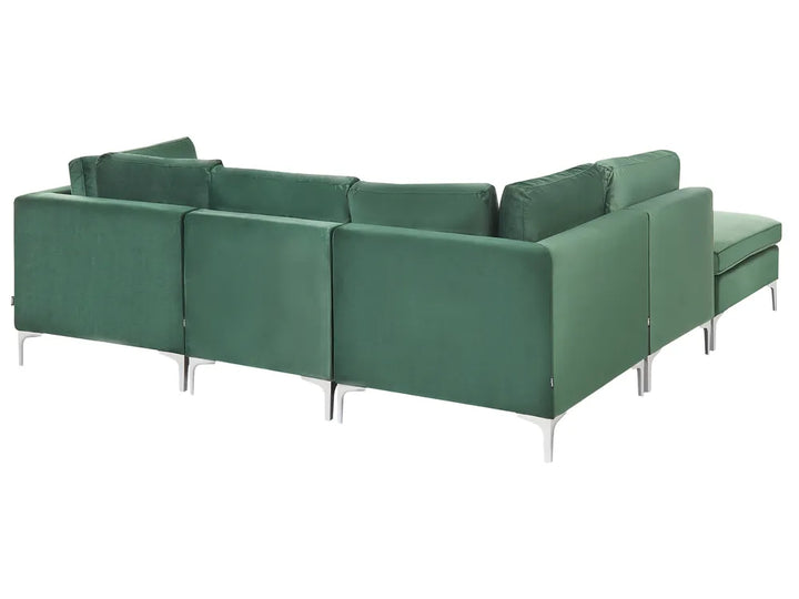 A modern sectional sofa upholstered in green fabric with slim silver metal legs, shown against a plain white background.