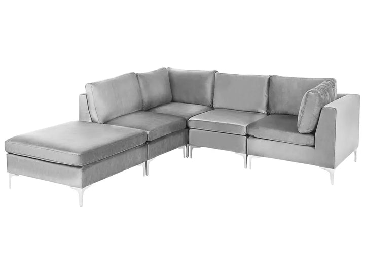 A modern light gray fabric sectional sofa with a chaise lounge on the right side, supported by slim silver metal legs, shown against a plain white background.