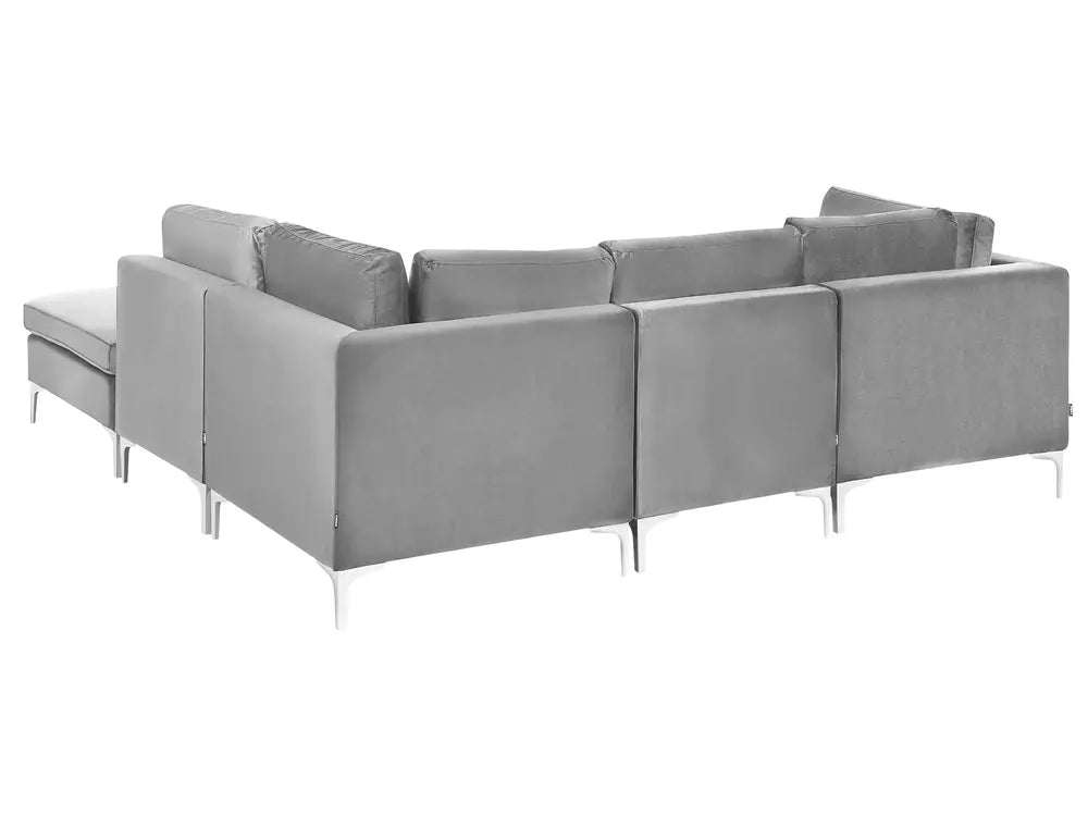 Grey velvet corner sofa with ottoman