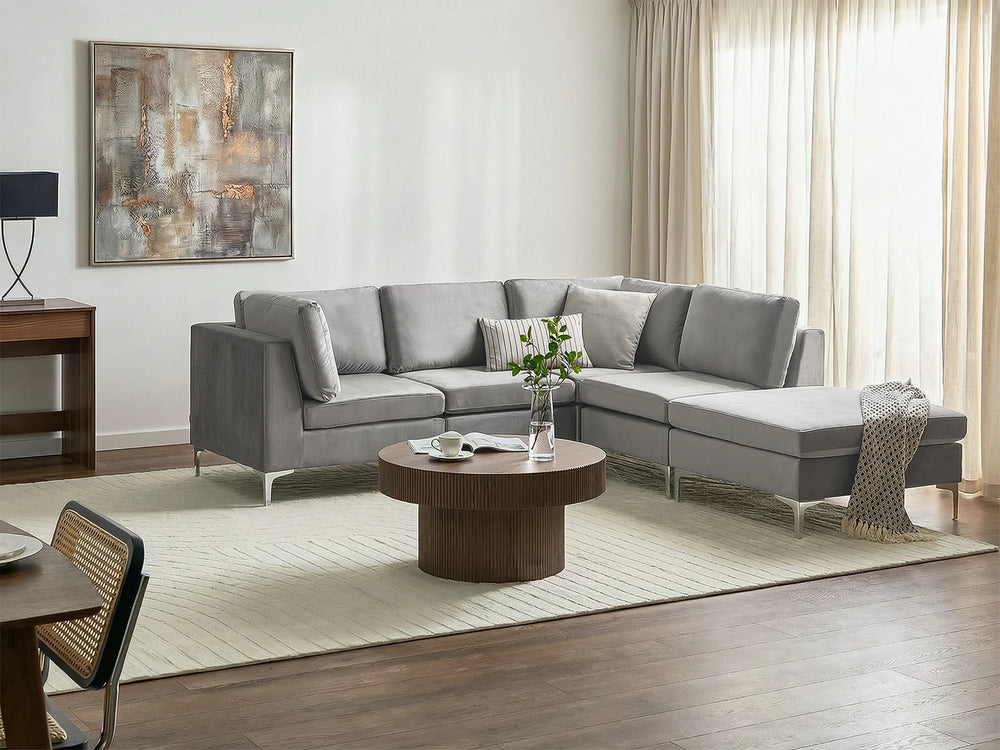 Grey velvet sofa with ottoman