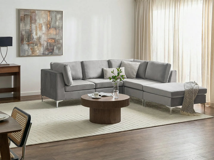 Grey velvet sofa with ottoman