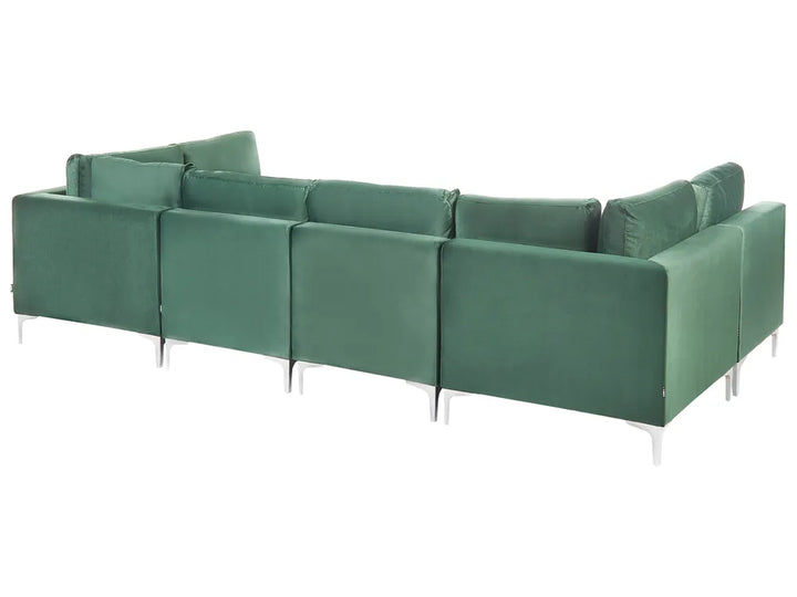 A modern sectional sofa upholstered in a textured sage green fabric, featuring slim silver metal legs, shown against a plain white background.