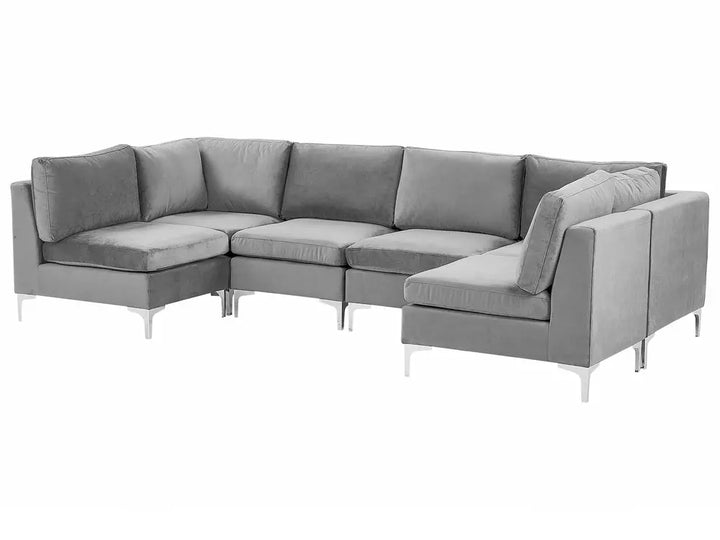 A modern gray fabric sectional sofa with a left-facing chaise lounge and slim metallic legs, shown against a plain white background.