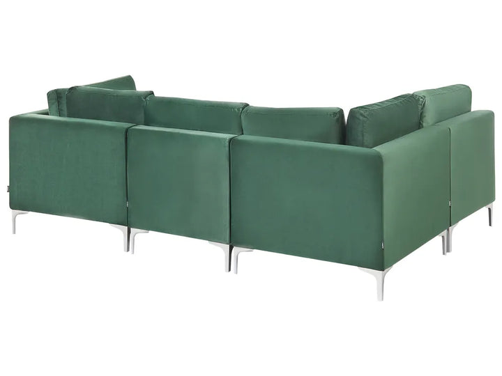 A modern modular sectional sofa upholstered in deep green fabric, featuring slim silver metal legs, shown against a plain white background.