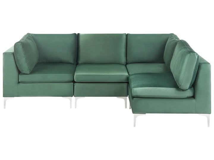 A modern three-seat sectional sofa upholstered in a textured sage green fabric, featuring a right-facing chaise lounge and slim white metal legs, shown against a plain white background.