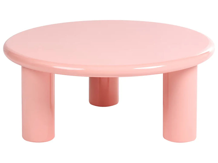 A low, round children's table with a glossy pastel pink finish and three cylindrical legs, shown against a plain white background.