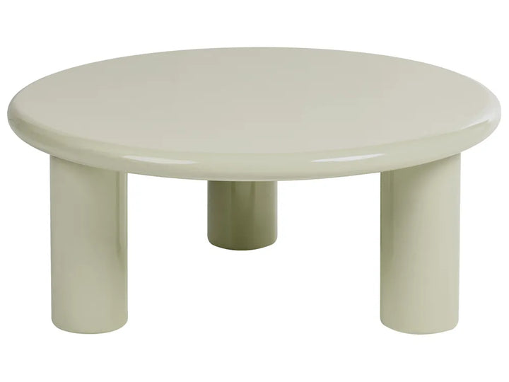 A minimalist round low table with thick cylindrical legs in a glossy off-white finish, isolated on a white background.