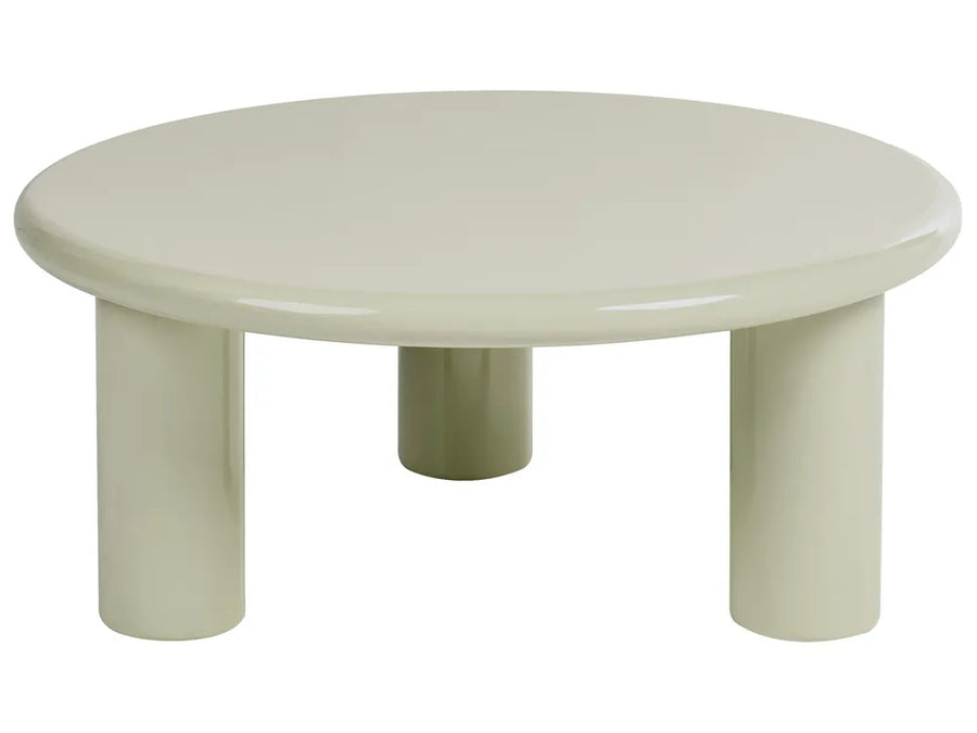A minimalist round low table with thick cylindrical legs in a glossy off-white finish, isolated on a white background.