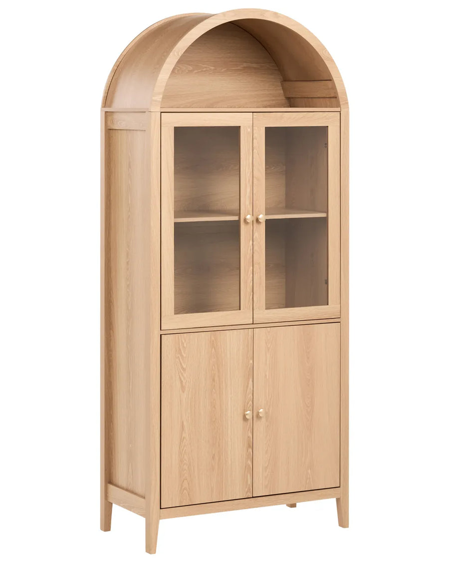 A tall light oak wood hutch cabinet with an arched top, two upper glass-front doors with small round knobs, and two lower solid wood doors with larger round knobs, shown on a plain white background.