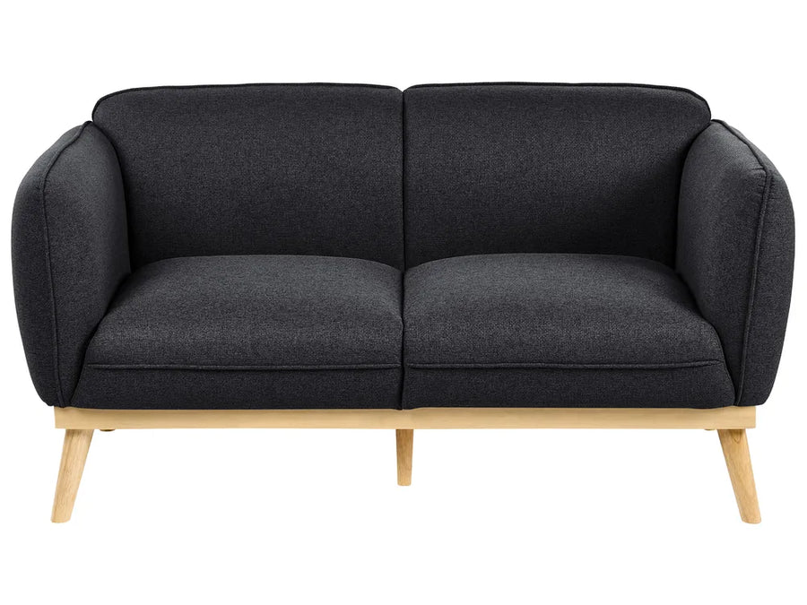 A modern two-seater sofa with dark charcoal gray textured fabric upholstery and light natural wood legs, shown against a plain white background.